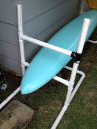 A leash cup to hold the leash, the fin box, and the fin on the bottom. Image Result For Pvc Stand Up Paddle Board Rack Paddle Board Storage Kayak Storage Rack Paddle Boarding