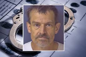 East Liverpool man accused of punching, dragging wife, running h