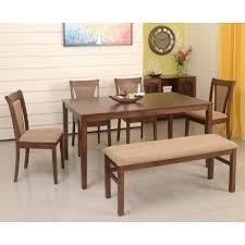 The table's surface is resistant to liquids, food stains, oil, heat, scratches and bumps, while its construction is stable, strong and durable to withstand years of daily use. Home By Nilkamal Jewel 6 Seater Dining Table Set Walnut Amazon In Home Kitchen