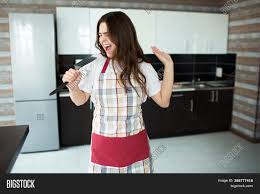 Tommy is in the kitchen. Young Woman On Kitchen Image Photo Free Trial Bigstock