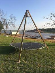 Trampoline Turned Backyard Lounge Swing Backyard Trampoline Diy Backyard Recycled Trampoline