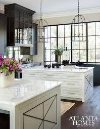 This fresh space uses black cabinetry, white countertops and a wall tiled all the way up to the ceiling. Design Supremacy Ah L Kitchen Design Kitchen Remodel Contemporary Kitchen