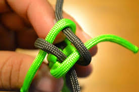Pull tight and adjust so the new layer fits How To Make A Knife Lanyard Or Utility Fob From Paracord Knifeup