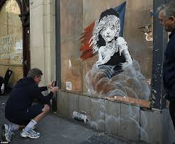 New artwork from anonymous street artist, banksy, depicting a boy playing with a nurse superhero doll has been unveiled at a british hospital. Is Robert Del Naja The Real Banksy Massive Attack Member Is Named As Graffiti Artist Daily Mail Online