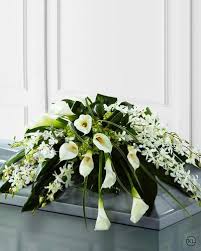 Maybe you would like to learn more about one of these? Calla Lily And Orchid Casket Spray Funeral Flowers London