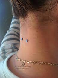 Vaughn Body Arts Brittney S Nape Piercing Four Months Old In This Unique Body Piercings Nape Piercing Neck Piercing