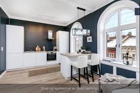 I have the white boxes with dark blue doors, and it doesn't bother me at all honestly. Diy Plywood Fronts For Massive Savings In Kitchen Do Over Ikea Hackers