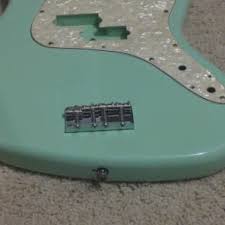 This instrument is nicely set up and comes with a fender hard shell case. Fender Mark Hoppus Signature Bass Body 2001 Surf Green Mike Reverb