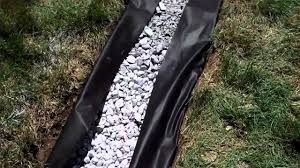 Proper trench width and depth. Draining Excess Water From A Lawn Youtube