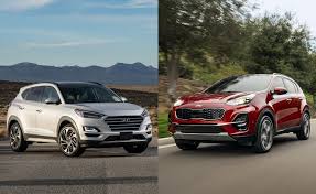 The popular hyundai tucson has again received the sport treatment and goes on sale shortly in south africa. Hyundai Tucson Vs Kia Sportage Comparison Which One Is Right For You Autoguide Com