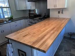 The edge grain blended maple table features a smooth surface. Chicago Butcher Block Established 1964