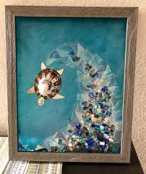 Resin Glass Art I Used Resin To Adhere Sea Glass And Colored Broken Shell Pieces To Create A Wave On Floa Sea Glass Art Glass Art Pictures Glass Art Projects