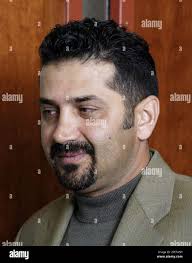 Hamid Moslehi, a witness in the Michael Jackson child molestation trial,  exits the courtroom at the Santa Barbara County Courthouse, Tuesday, April  26, 2005, in Santa Maria, California, during a break in