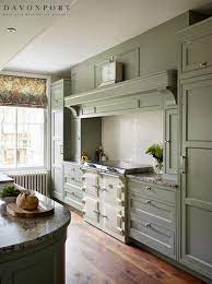 A kitchen table, kitchen island or butcher's block at the heart will make it a space where everyone can gather. In Keeping With The Traditionally English Design A Cream Everhot Range Cooker Fits The Kitchen Perfectly The Cl Grand Kitchen Kitchen Interior Kitchen Design