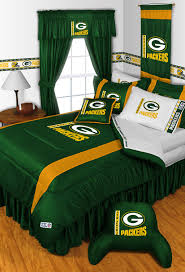 View looking up at the green and gold donald driver way road sign at the intersection of dousman street in green bay wisconsin home of the packers football team with blue. Nfl Green Bay Packers Bedding And Room Decorations Modern Jacksonville By Obedding