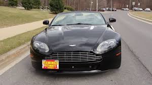 Image result for Jet Black 2010 Aston Martin