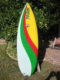 vintage 1980s era McCoy quad-fin surfboard 5-8 colorful
