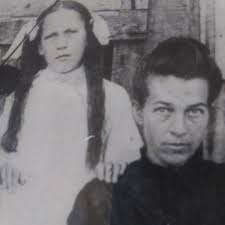 This is a picture of my Mom (long braids) and my grandmother. She was a  school teacher and rode a horse or either walked to school sometimes  staying with families in the