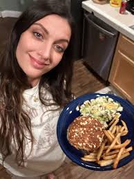 Berlinsville bar-hotel's triple smash campfire burger special