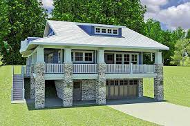 Plan 18277be Craftsman Home With Drive Under Garage In 2021 House Built Into Hillside Sloping Lot House Plan Small Lake Houses