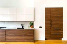 Cords are not permitted to be run through walls of cabinets (with the exception of cords on things like a dishwasher with the appropriate appliance cord), or any other walls. Refrigerator In Disguse 8 Paneling Designs To Hide A Fridge Door