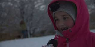 Folks enjoy a day in the snow, while others wish they stayed indoors