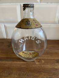 vintage dimple whisky bottle John Haig and co