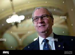 Members of the North Dakota House of Representatives help themselves to a  free lunch buffet at the Capitol in Bismarck, N.D., Tuesday, Feb. 13, 2007.  The free lunch was provided by the