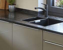 Typically, a kitchen sink cabinet is wide enough to accommodate the sink insert, and has two doors of equal width. Cabinet Width Sinks
