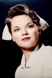 The happy little baby girl in this photo is our late Mom, Nancy McDevitt  Kuhn, in the arms of Julie, a family friend, in West Philly in 1932.  Yesterday, 2/11, marked her