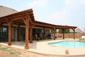 These shades can be opened up when you want to take in the outdoors, but when you need privacy, you can tie them around the posts. Ft Worth Outdoor Kitchen Photos Keller Outdoor Fireplaces