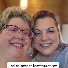 I had to take the girls to the dentist today and they always like a picture  out front. They coerced Nana into going along too. Needless to say, it's  never boring around