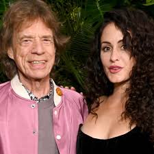 Mick Jagger Makes Rare Appearance With Girlfriend