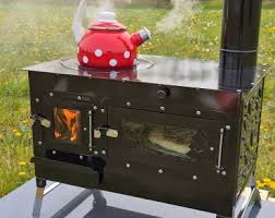 Kaminofen kaufen bei hark riesige auswahl moderne kaminöfen maximale effizienz minimale umweltbelastung individuelle gestaltung. Outdoor Kochen Und Backen Im Garten Mit Ofen Und Herd