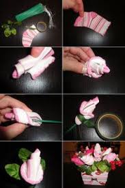 3 adding greenery and attaching the bouquet. 29 Best Baby Sock Corsage Ideas Baby Sock Corsage Baby Shower Gifts Baby Socks