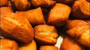 Coconut buns mandazi kenyan doughnuts 6 pour batter in the cake pop machine 7 bake until golden brown tip pour batter right to the lip to get nice and round shapes. How To Make Mandazi Maandazi Swahili East African Snack Youtube