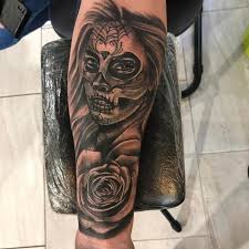 This dark piece has a surprise as the arm turns. Dia De Los Muertos Tattoo Sleeve