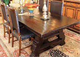 Its solid mahogany construction adds quality to a beautiful dining room focal point. Reclaimed Wood Spanish Trestle Dining Table In A Distressed Dark Stain Finish Mediterranean Dining Room Los Angeles By Mortise Tenon Custom Furniture Store Houzz