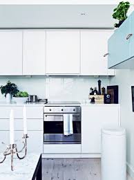 One tip to removing backsplash tile is to go in on an angle so that you do not go directly into the drywall. Glass Kitchen Backsplash Ideas Tile Alternative Apartment Therapy