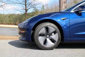 The basic version features an operating range of approximately 350 kilometres, versus 500 for the variants endowed with a more powerful battery. 2018 Tesla Model 3 Long Range First Drive Review Of 310 Mile Electric Car