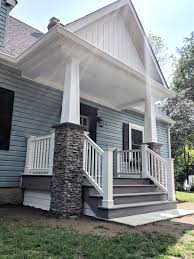 The porch company, well known for its front porch construction detailing, added brick sills to the windows on the left side to match the windows on the right. Porch Remodels Start With The Foundation Ayars Complete Home Improvements Inc