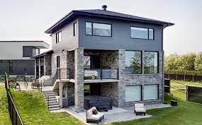 You've heard the expression black goes with everything. that's because black is a neutral color, just like white, gray, beige, and brown. Black House The Beauty Of Black Siding Gambrick