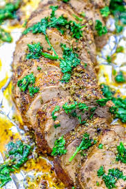 Remove pork loin from oven and cover it with foil to let it rest for about 15 minutes. Sliced Baked Pork With Herbs On Foil Recipe Picture Pork Tenderloin Recipes Garlic Pork Tenderloin Recipe Tenderloin Recipes