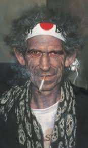 Keith really DOES wear Habit Rouge... among other things.