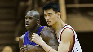 Shaq holding the rock and getting held by yao ming. Prime Shaq Vs A Rookie Yao Ming Basketball Network