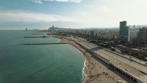 Все для планирования идеального путешествия: The Skyline Of Barcelona With The Sea The Beach And Modern Buildings By Jackfaam