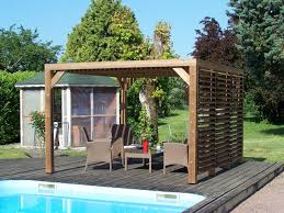 Pergola En Bois Utilisations Montage Et Reglementation Pergola originale avec un banc est l'addition parfaite à tout jardin. pergola en bois utilisations montage