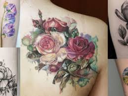 Cross with flowers inside tattoo. Your A Z Guide To Flower Tattoo Meanings Symbolisms And Birth Flowers Tattoo Ideas Artists And Models