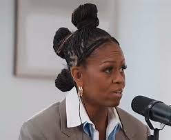 Michelle Obama recently debuted a new look as a podcast host, donning  braids and a grey blazer.