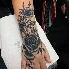 Well, not literally i suppose, but it sure has all that a this one's interesting. 20 Rose Tattoo Designs Ideas Design Trends Premium Psd Vector Downloads